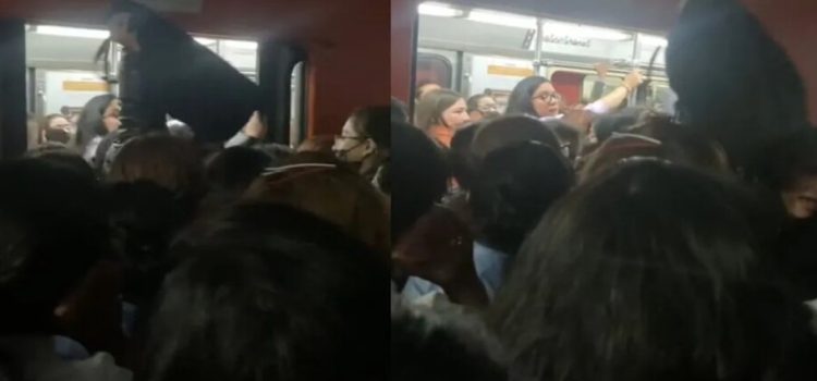 Mujer se vuelve viral al intentar salir del Metro