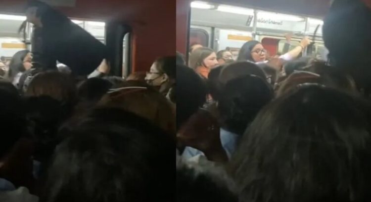 Mujer se vuelve viral al intentar salir del Metro